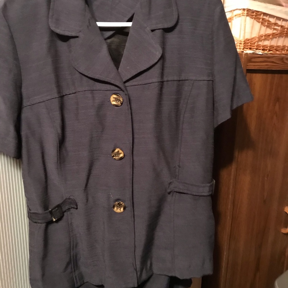Navy blue spring suit. Top and knee length skirt